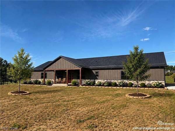 6.18 Acres of Land with Home for Sale in Louisville, Ohio