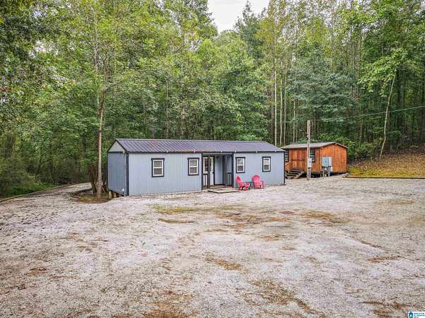 11.7 Acres of Recreational Land with Home for Sale in Delta, Alabama