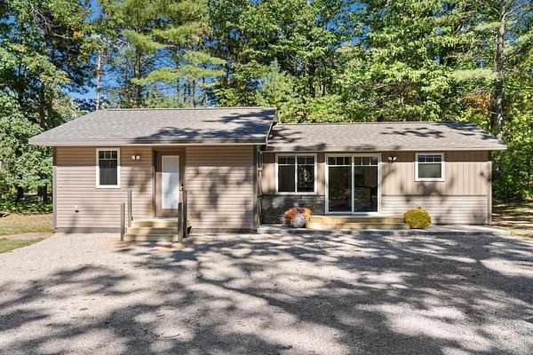6.78 Acres of Land with Home for Sale in Indian River, Michigan