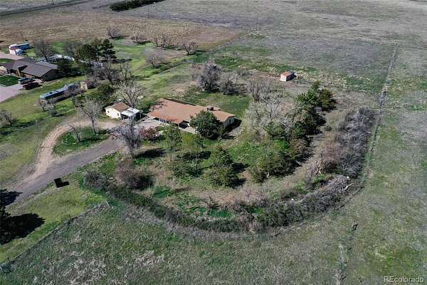 10 Acres of Land with Home for Sale in Strasburg, Colorado