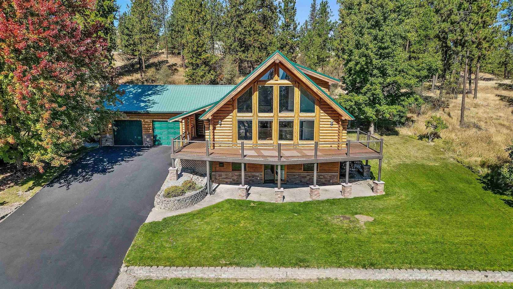 5.19 Acres of Land with Home for Sale in Otis Orchards, Washington