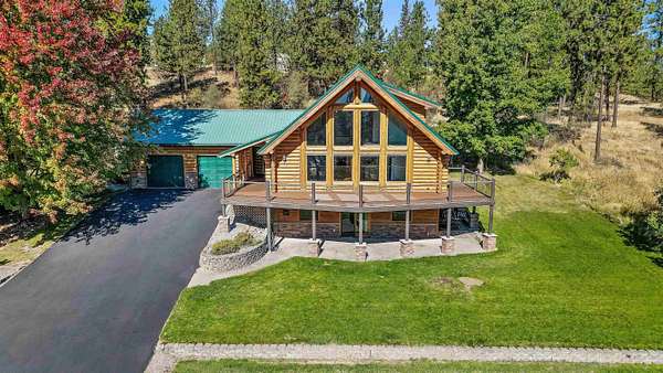 5.19 Acres of Land with Home for Sale in Otis Orchards, Washington