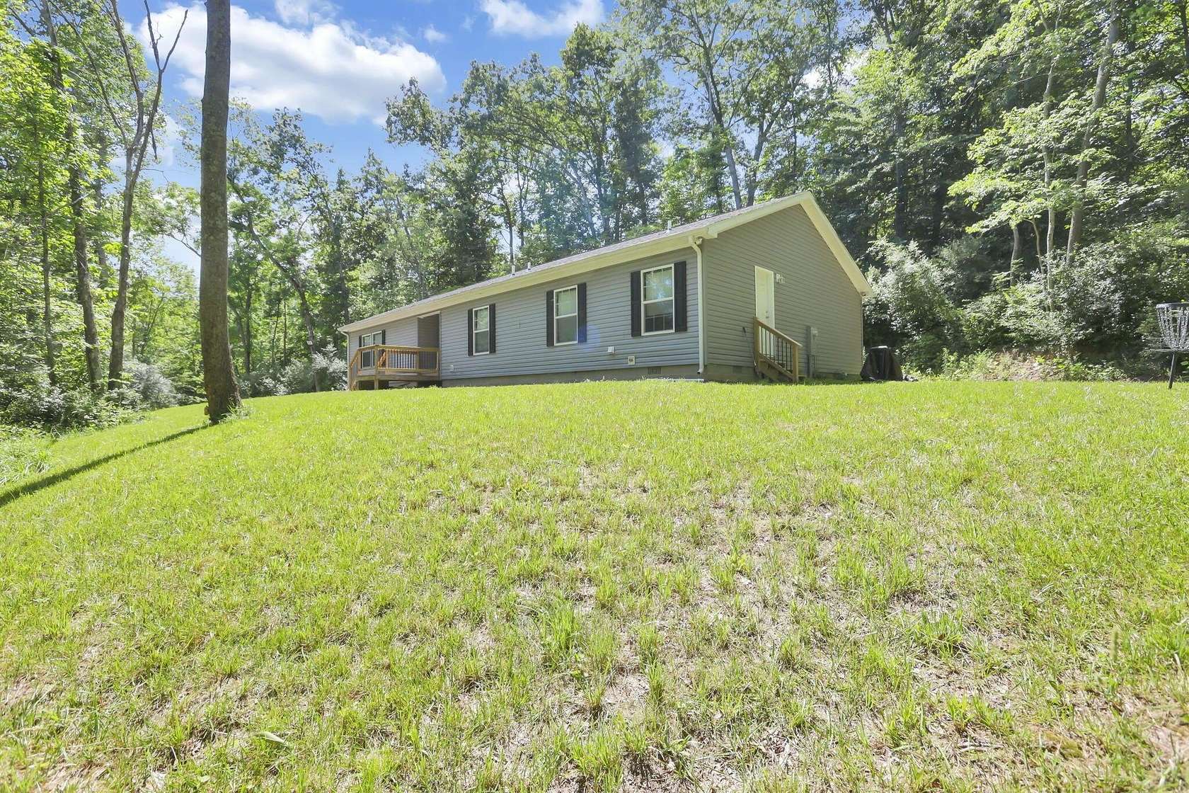 6.77 Acres of Land with Home for Sale in Rockbridge, Ohio