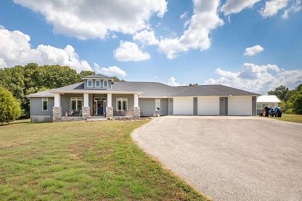 10 Acres of Recreational Land with Home for Sale in Lowell, Arkansas