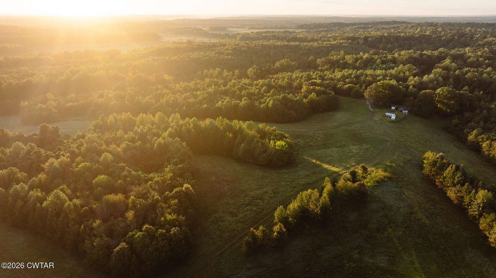 404 Acres of Land for Sale in Hollow Rock, Tennessee