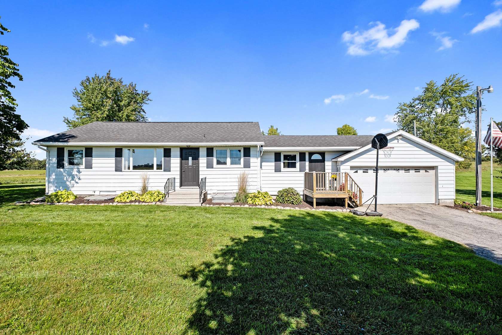 2 Acres of Land with Home for Sale in Coopersville, Michigan