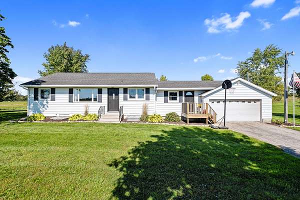 2 Acres of Land with Home for Sale in Coopersville, Michigan