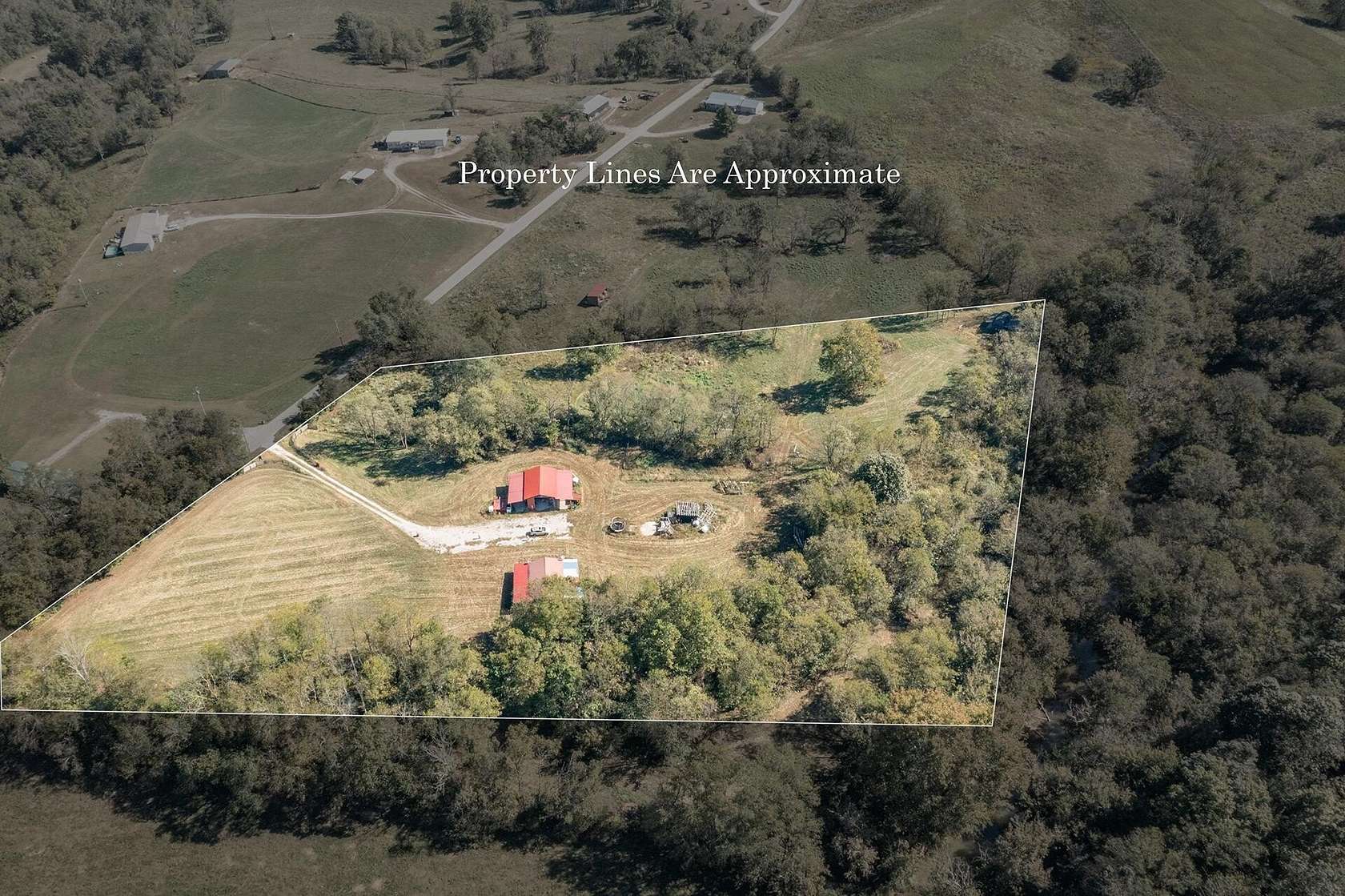 12.3 Acres of Recreational Land with Home for Sale in Sharpsburg, Kentucky