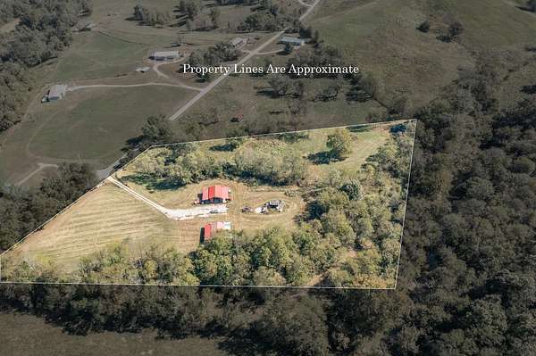 12.3 Acres of Recreational Land with Home for Sale in Sharpsburg, Kentucky