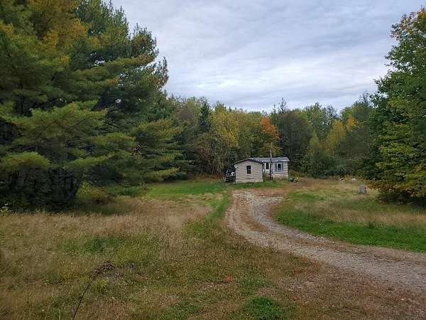 2.3 Acres of Land with Home for Sale in Enfield, Maine