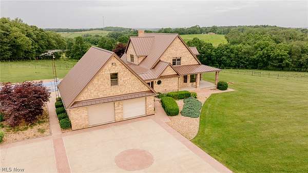 17.9 Acres of Land with Home for Auction in Rogers, Ohio