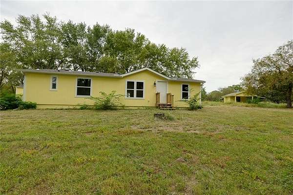 5 Acres of Land with Home for Sale in Holden, Missouri