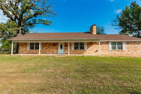 10 Acres of Land with Home for Sale in Chandler, Texas