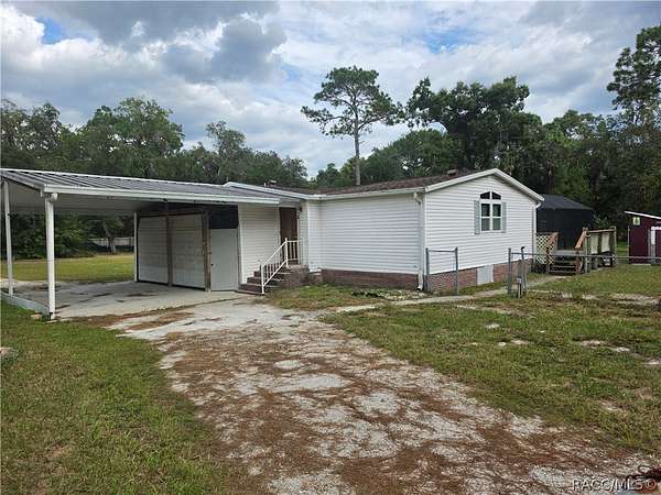 2.32 Acres of Land with Home for Sale in Homosassa, Florida