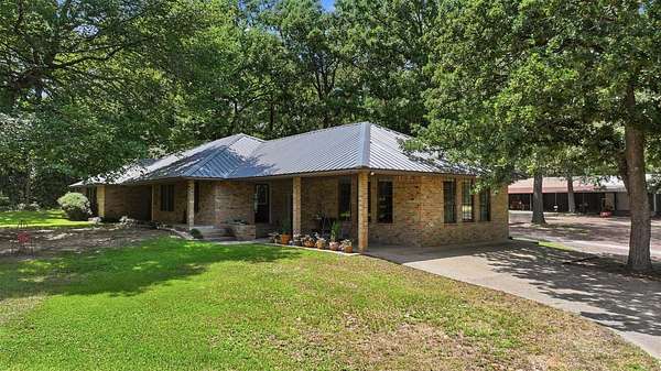 11.6 Acres of Land with Home for Sale in Big Sandy, Texas