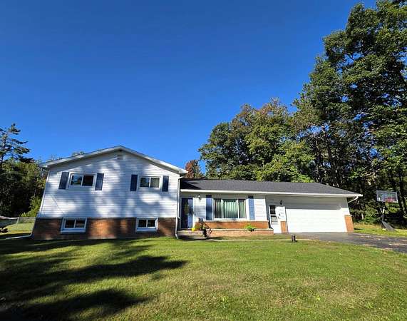 2.64 Acres of Land with Home for Sale in Ossineke, Michigan
