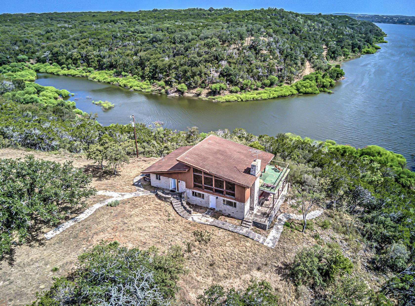 16.2 Acres of Land with Home for Sale in Marble Falls, Texas