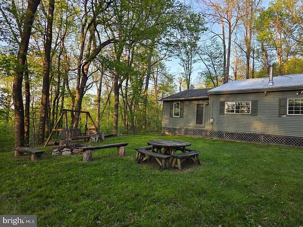 10.1 Acres of Recreational Land with Home for Auction in Thompsontown, Pennsylvania