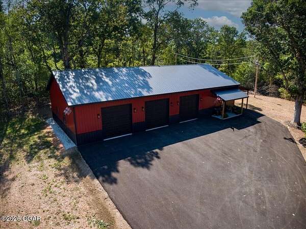 10.5 Acres of Recreational Land with Home for Sale in Seneca, Missouri