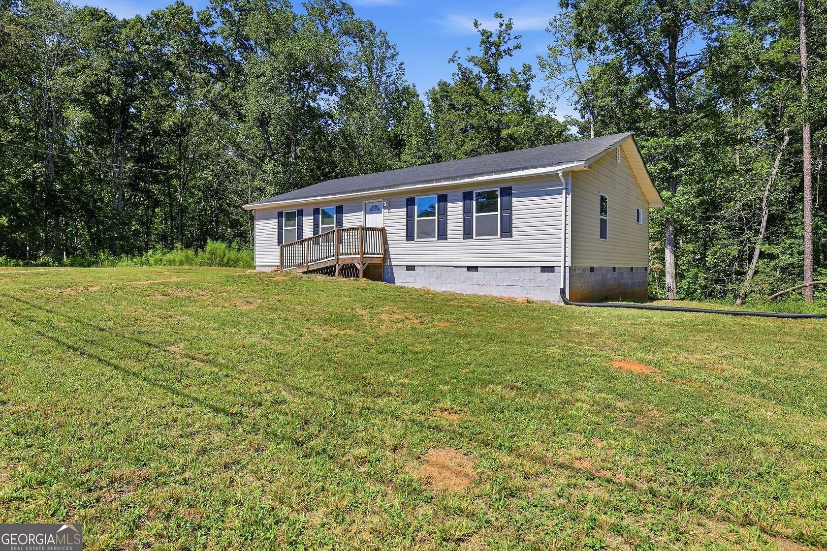 6.73 Acres of Land with Home for Sale in Toccoa, Georgia