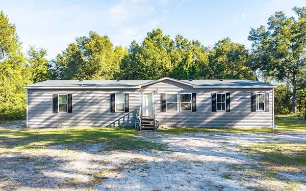 3 Acres of Land with Home for Sale in O'Brien, Florida