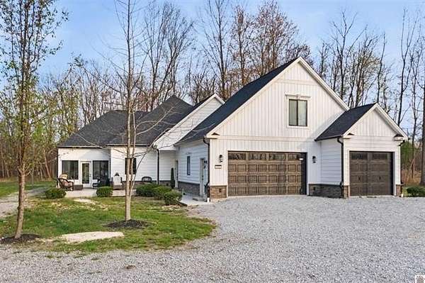 5 Acres of Land with Home for Sale in Paducah, Kentucky