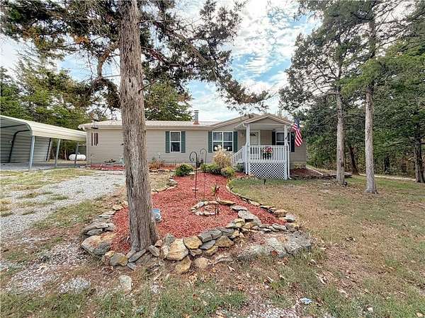 2.44 Acres of Land with Home for Sale in Warsaw, Missouri