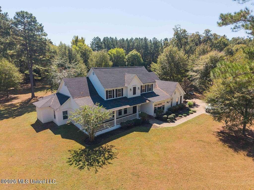 11.8 Acres of Land with Home for Sale in Flora, Mississippi