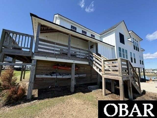 10.9 Acres of Land with Home for Sale in Stumpy Point, North Carolina
