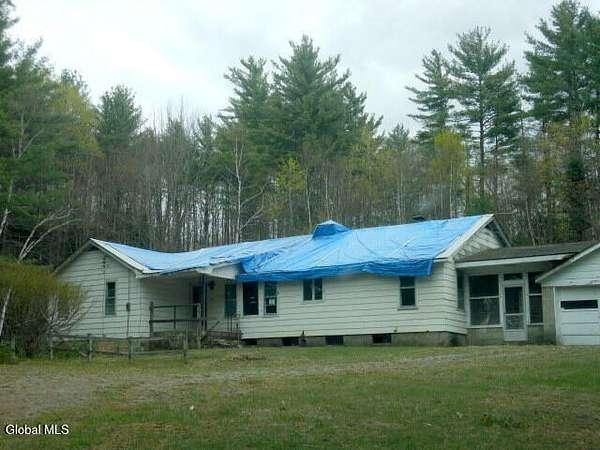 16.9 Acres of Land with Home for Sale in Athol, New York