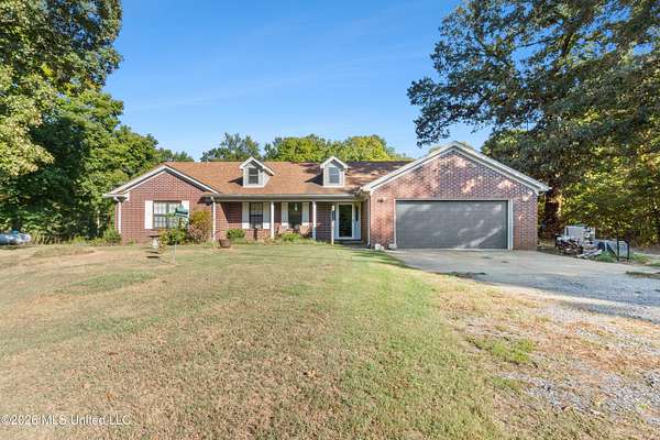 7.4 Acres of Land with Home for Sale in Walls, Mississippi
