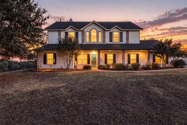 22.9 Acres of Agricultural Land with Home for Sale in Weatherford, Texas