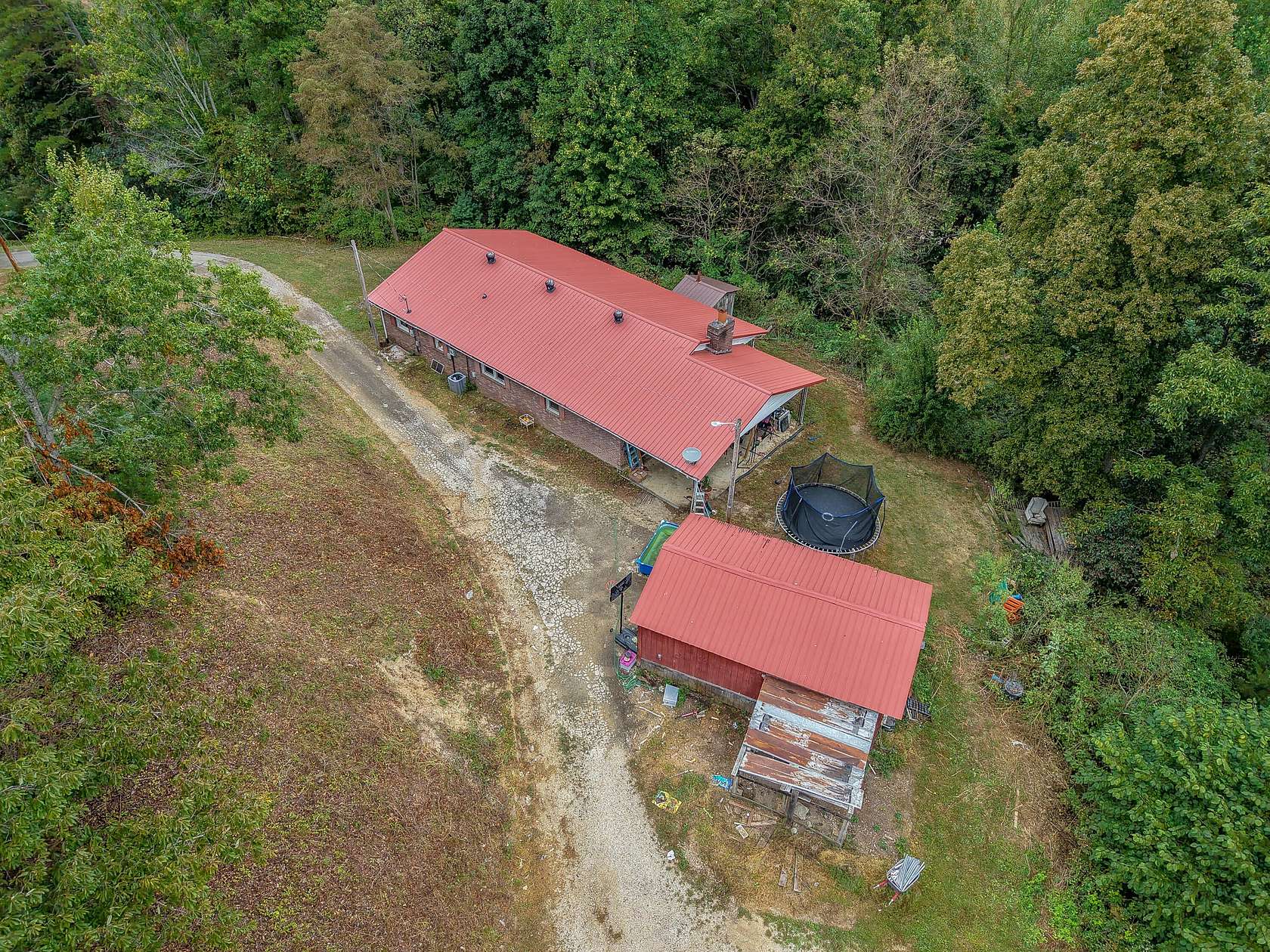 7.26 Acres of Land with Home for Sale in Campton, Kentucky