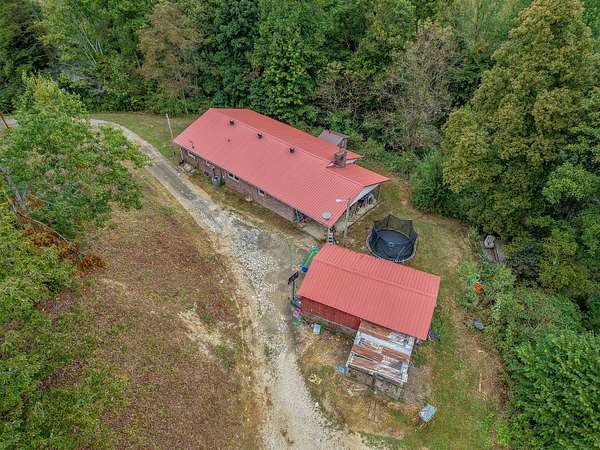 7.26 Acres of Land with Home for Sale in Campton, Kentucky