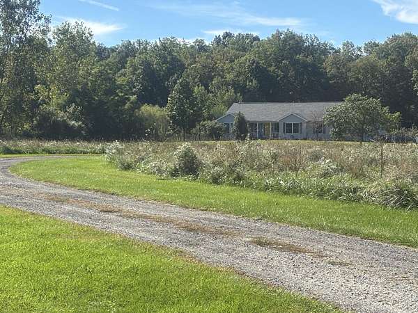 16.6 Acres of Land with Home for Sale in Three Oaks, Michigan
