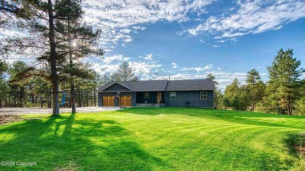 7 Acres of Land with Home for Sale in Pine Haven, Wyoming