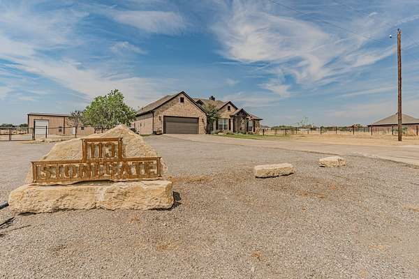 2.47 Acres of Land with Home for Sale in Brock, Texas