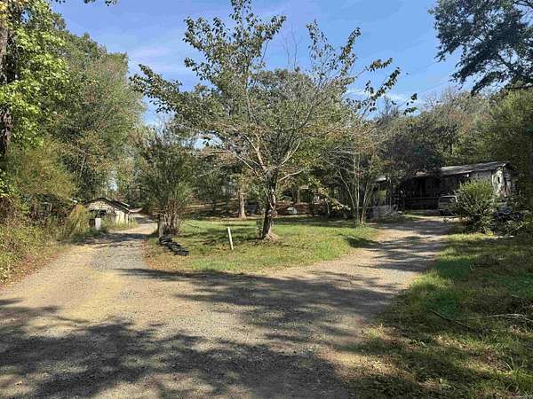 4.14 Acres of Land with Home for Sale in Mena, Arkansas