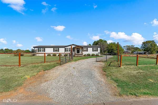 2 Acres of Land with Home for Sale in Benton, Louisiana