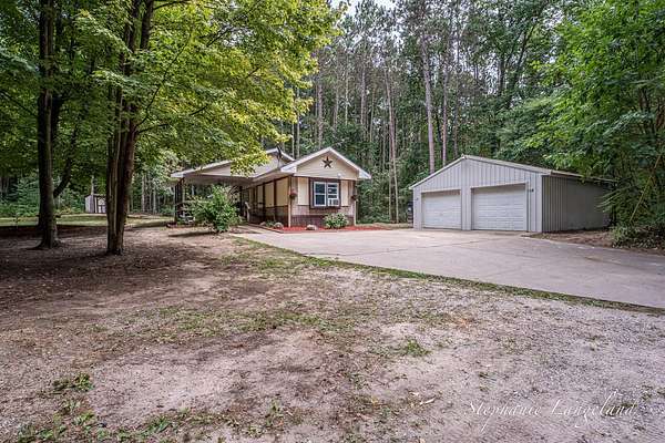 6.82 Acres of Land with Home for Sale in Holton, Michigan