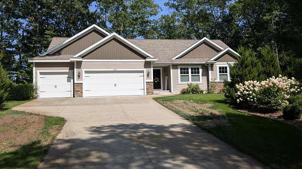 3.3 Acres of Land with Home for Sale in Twin Lake, Michigan