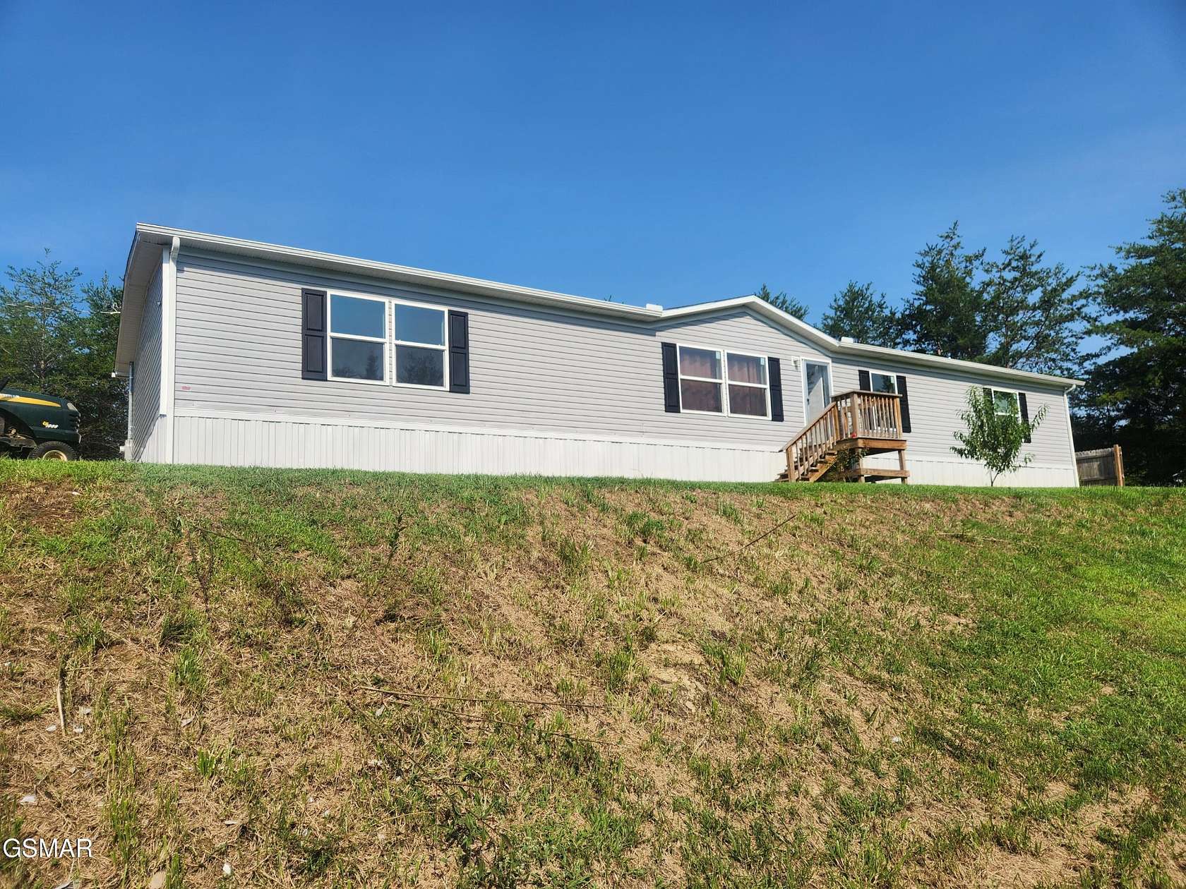 1.57 Acres of Land with Home for Sale in Kodak, Tennessee