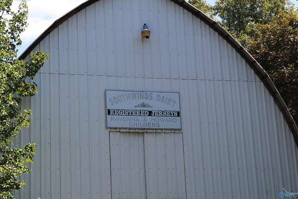 97 Acres of Land with Home for Sale in Hartselle, Alabama