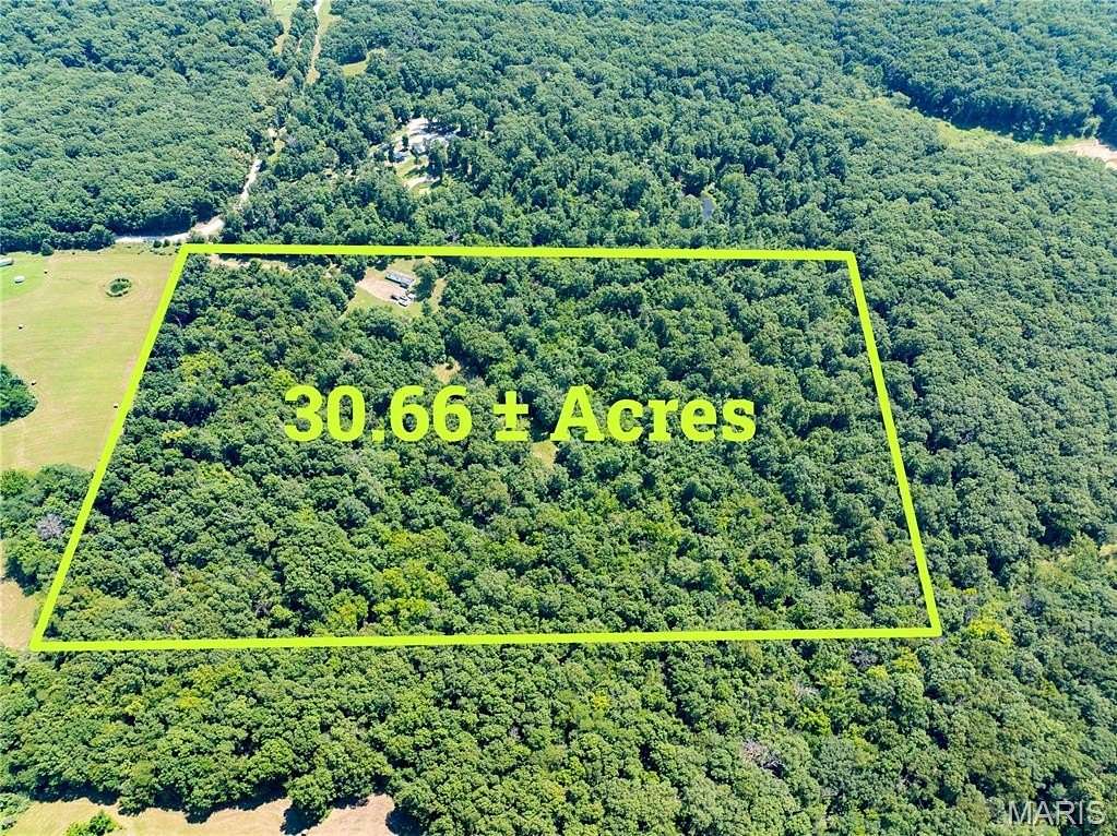 30.7 Acres of Recreational Land with Home for Sale in Stoutsville, Missouri