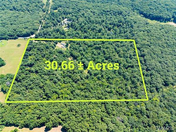 30.7 Acres of Recreational Land with Home for Sale in Stoutsville, Missouri