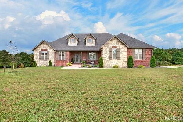 5.1 Acres of Land with Home for Sale in Lebanon, Missouri