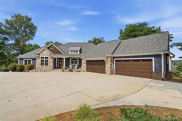 2.56 Acres of Land with Home for Sale in Green Oak Township, Michigan