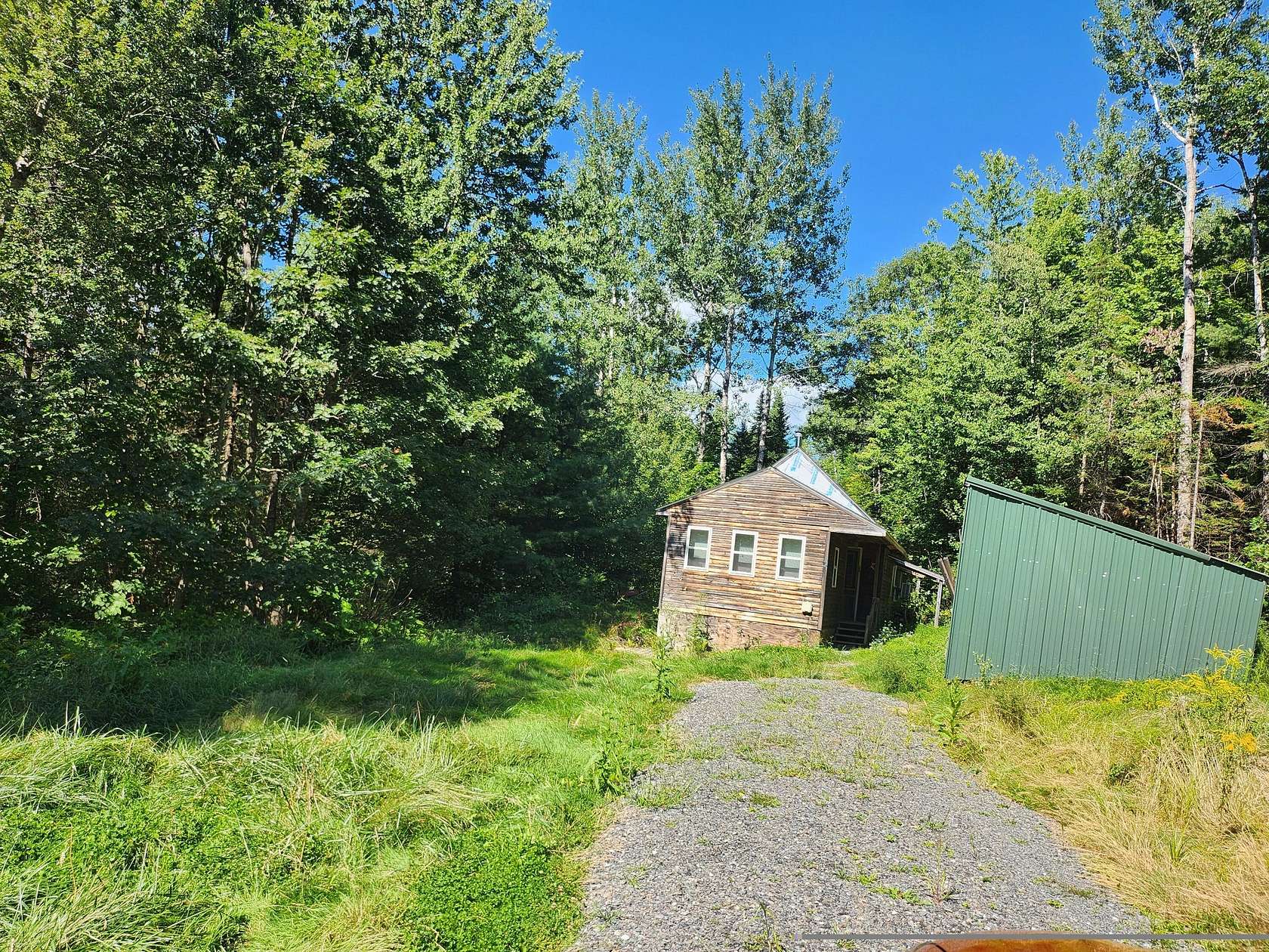 21.3 Acres of Recreational Land with Home for Sale in Hartland, Maine
