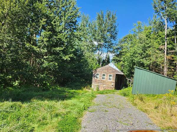 21.3 Acres of Recreational Land with Home for Sale in Hartland, Maine
