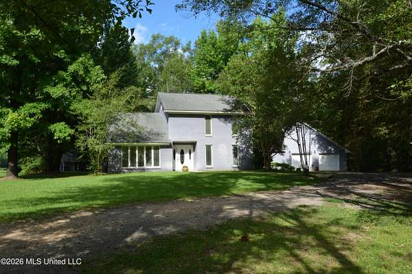 3.25 Acres of Land with Home for Sale in Clinton, Mississippi